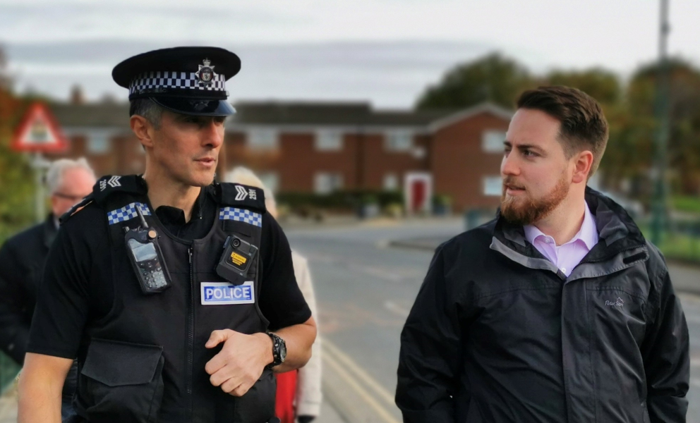 Jacob Young with Police Officer